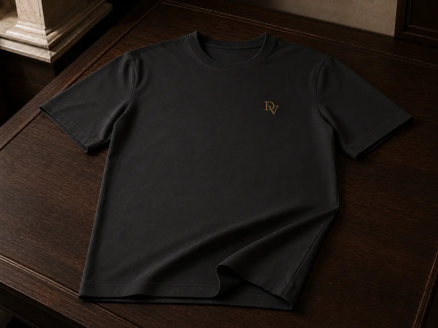 Black DUVANT T-shirt in a warm editorial setting